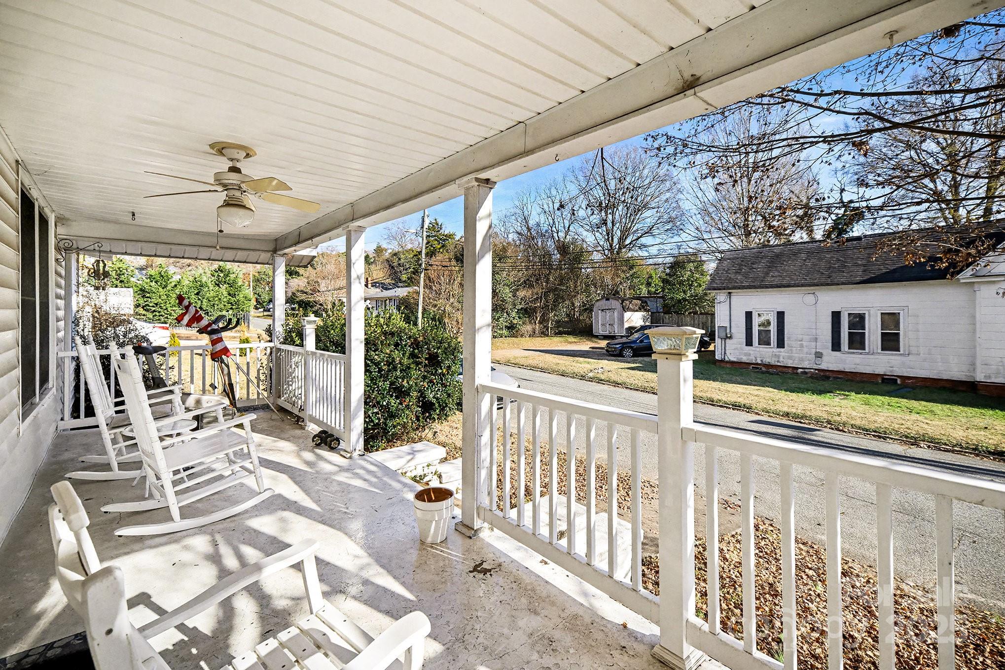 352 Kerr Street Northwest Concord, NC 28025 - Photo 11 of 41 a view of a patio with a table chairs and a yard
