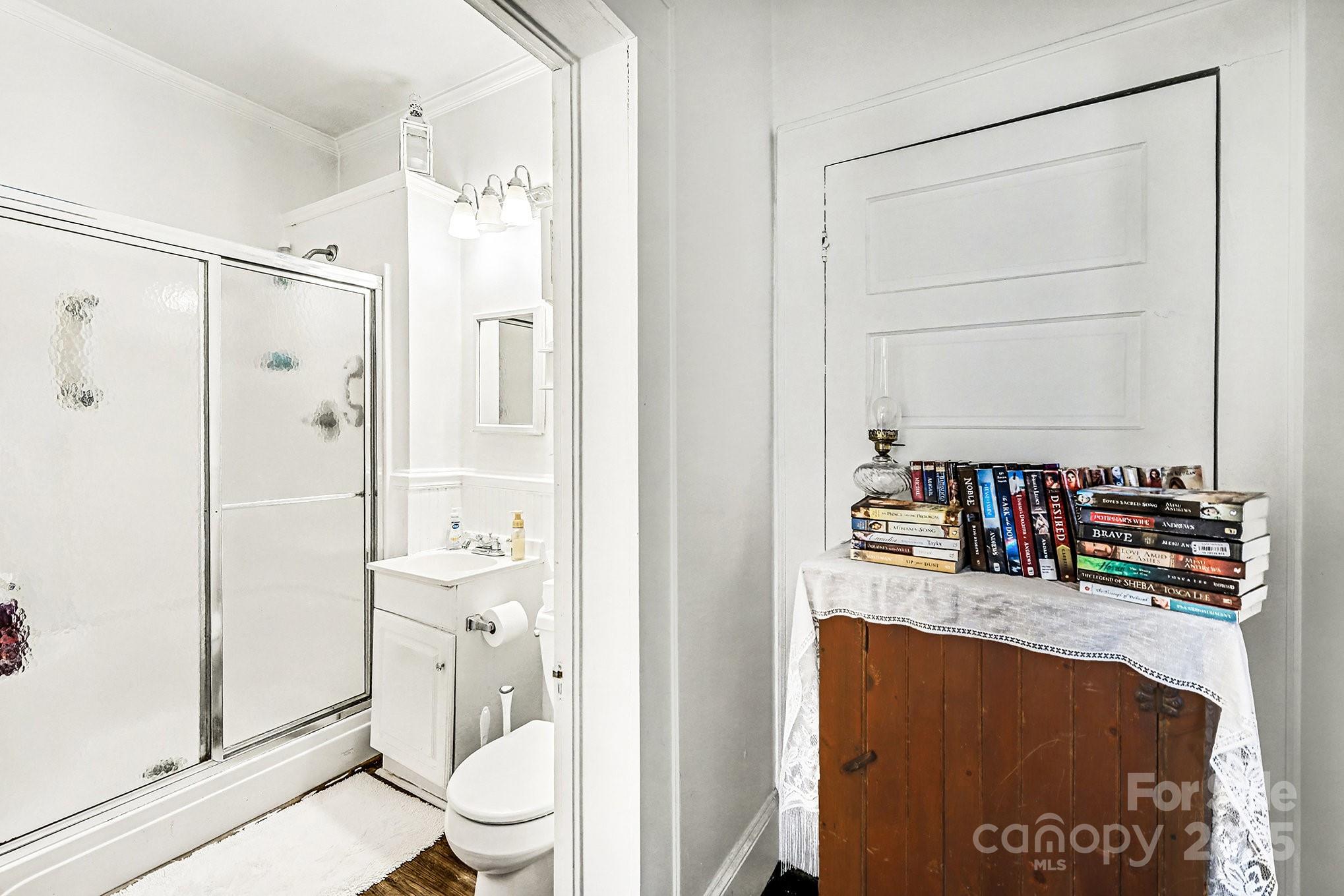 352 Kerr Street Northwest Concord, NC 28025 - Photo 25 of 41 a bathroom with a granite countertop sink toilet and shower
