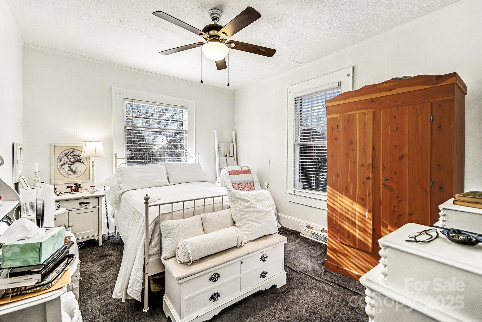 352 Kerr Street Northwest Concord, NC 28025 - Photo 27 of 41 a bedroom with furniture and a window