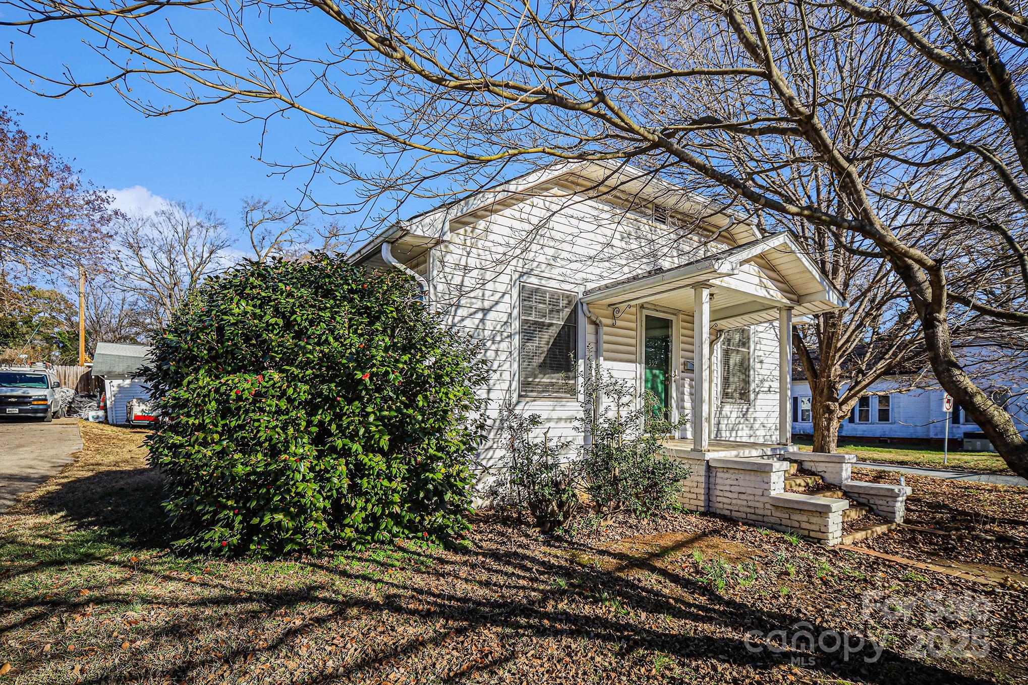 352 Kerr Street Northwest Concord, NC 28025 - Photo 3 of 41 a view of a house with a yard