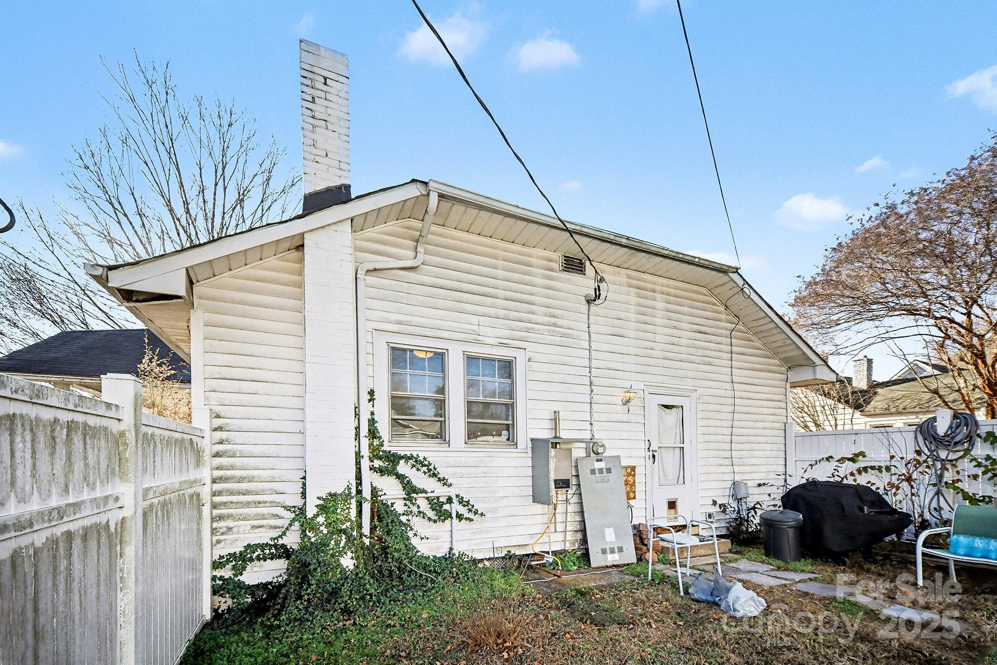 352 Kerr Street Northwest Concord, NC 28025 - Photo 35 of 41 a view of a house with a backyard