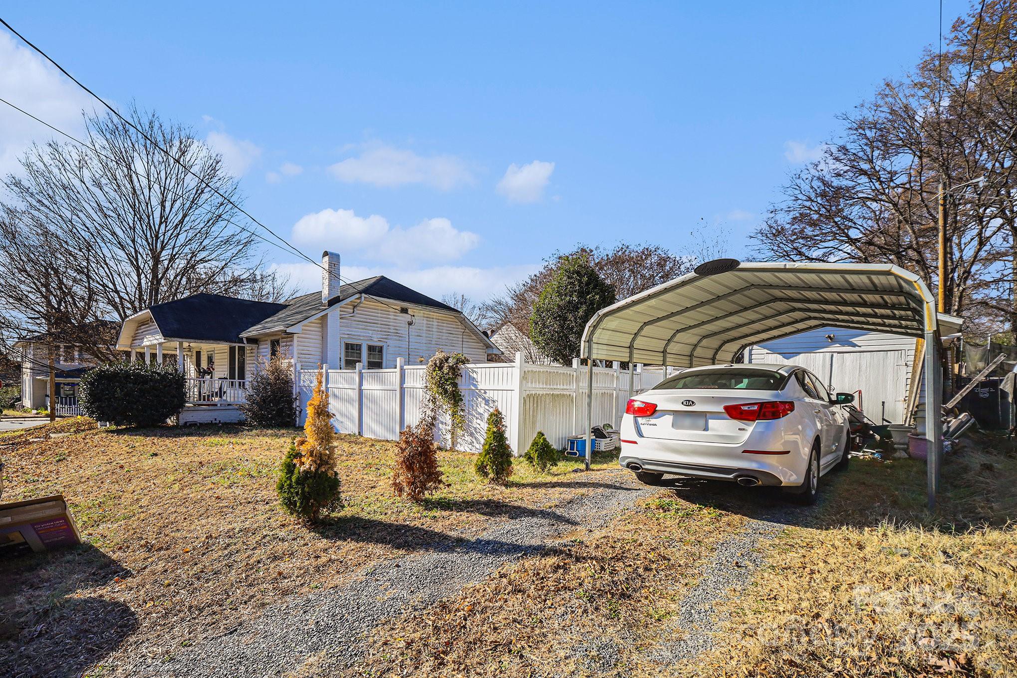 352 Kerr Street Northwest Concord, NC 28025 - Photo 37 of 41 a view of a house with cars parked in front of house
