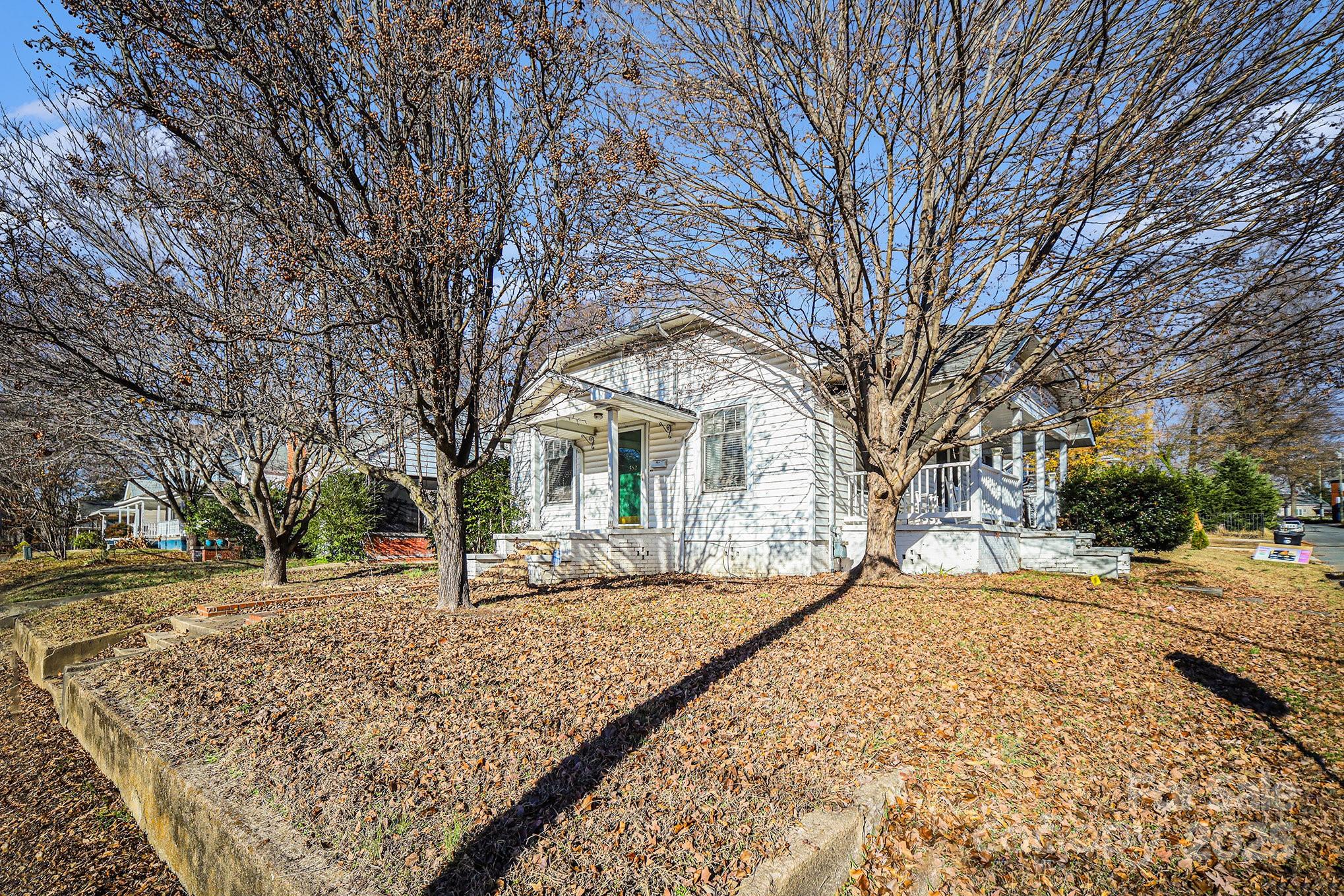 352 Kerr Street Northwest Concord, NC 28025 - Photo 4 of 41 a view of a yard with a tree