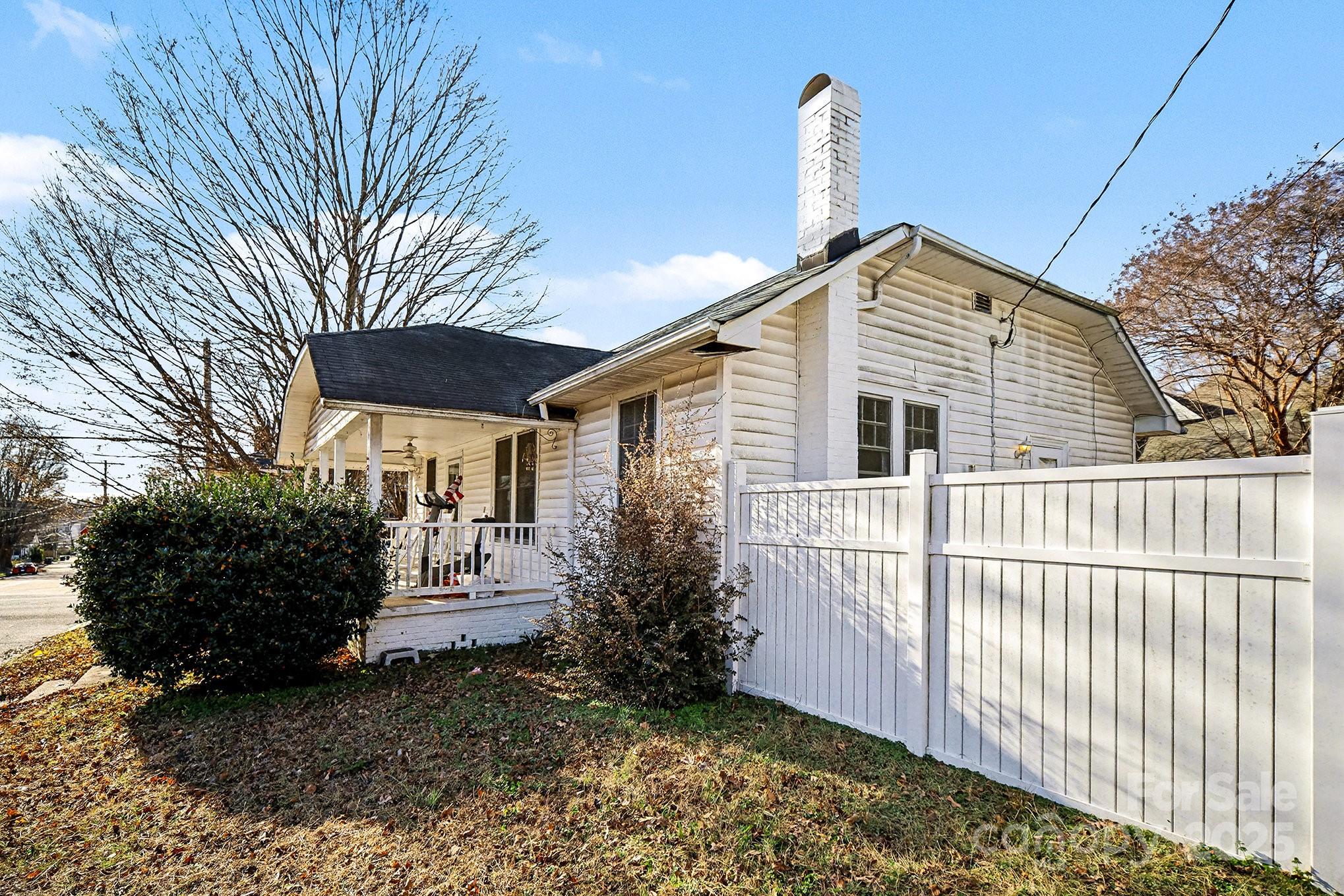 352 Kerr Street Northwest Concord, NC 28025 - Photo 5 of 41 a view of a house with a yard
