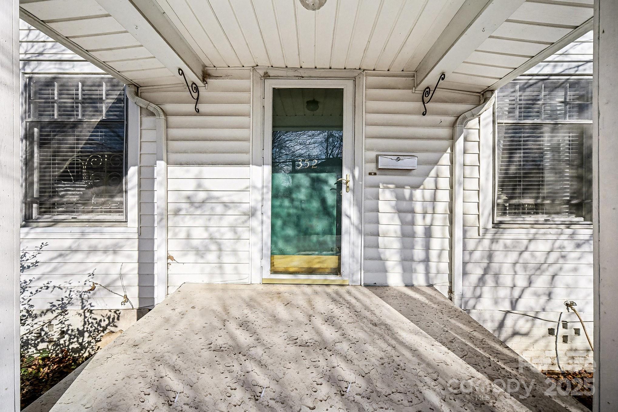 352 Kerr Street Northwest Concord, NC 28025 - Photo 7 of 41 a view of a front door of a house