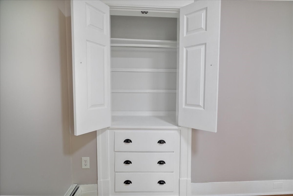 6 Chatham Place, Unit 6 Worcester, MA 01609 - Photo 20 of 31 a close up of a wall with a cabinet