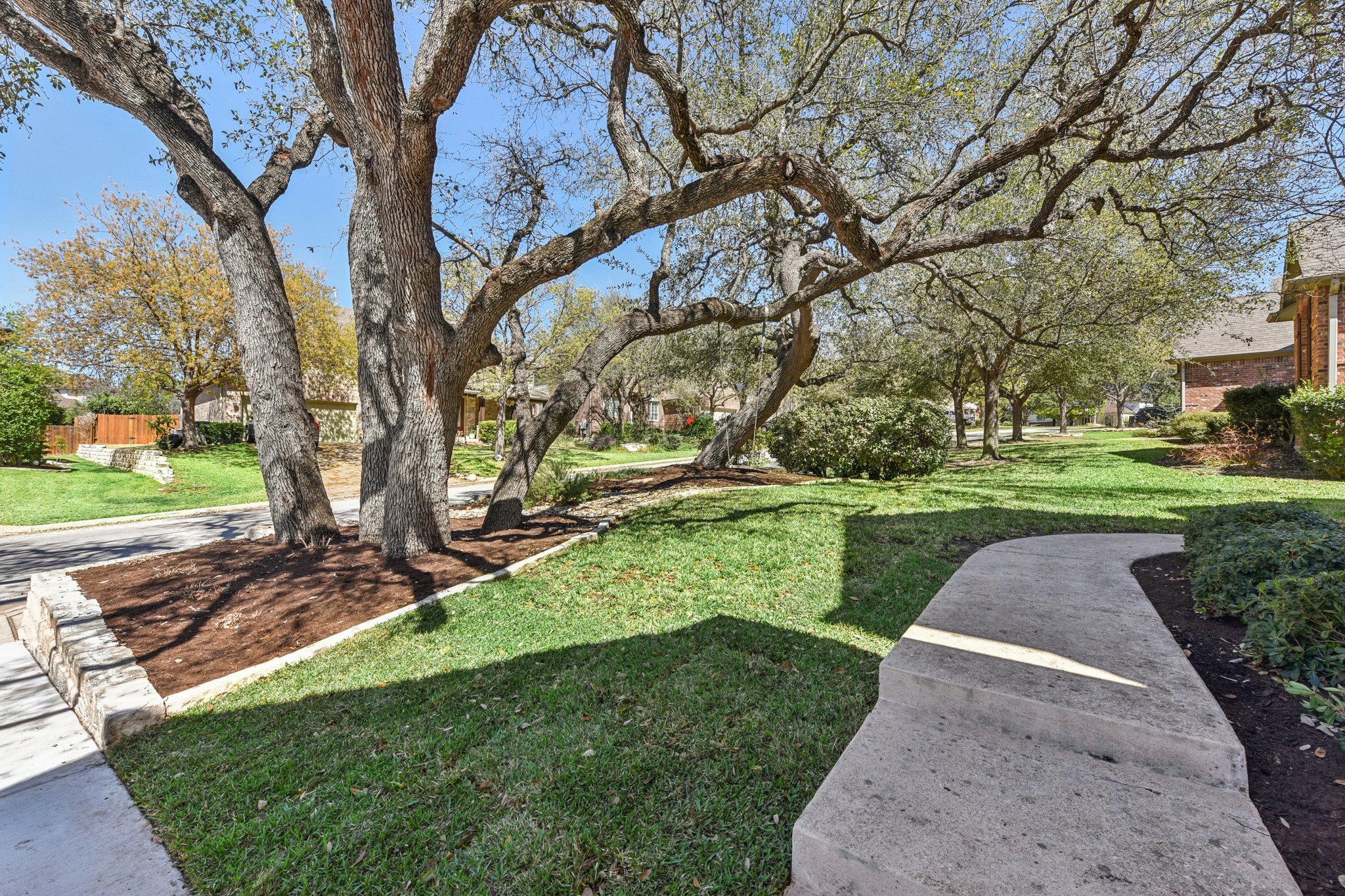 12913 Little Dipper Path Austin, TX 78732 - Photo 17 of 30 a view of a garden with trees