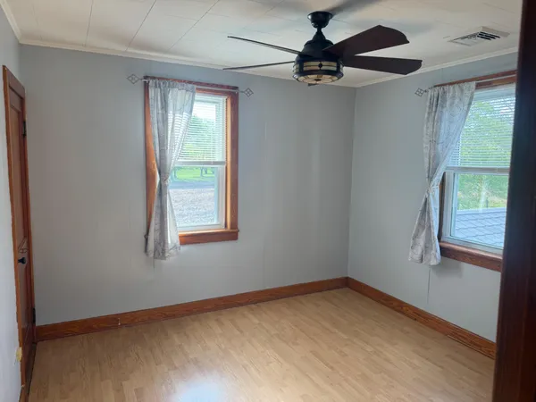 a view of an empty room and window