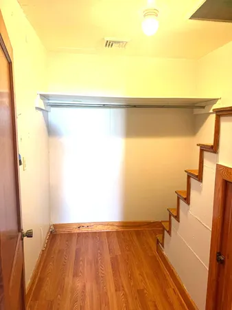 a kitchen with a stove and a microwave
