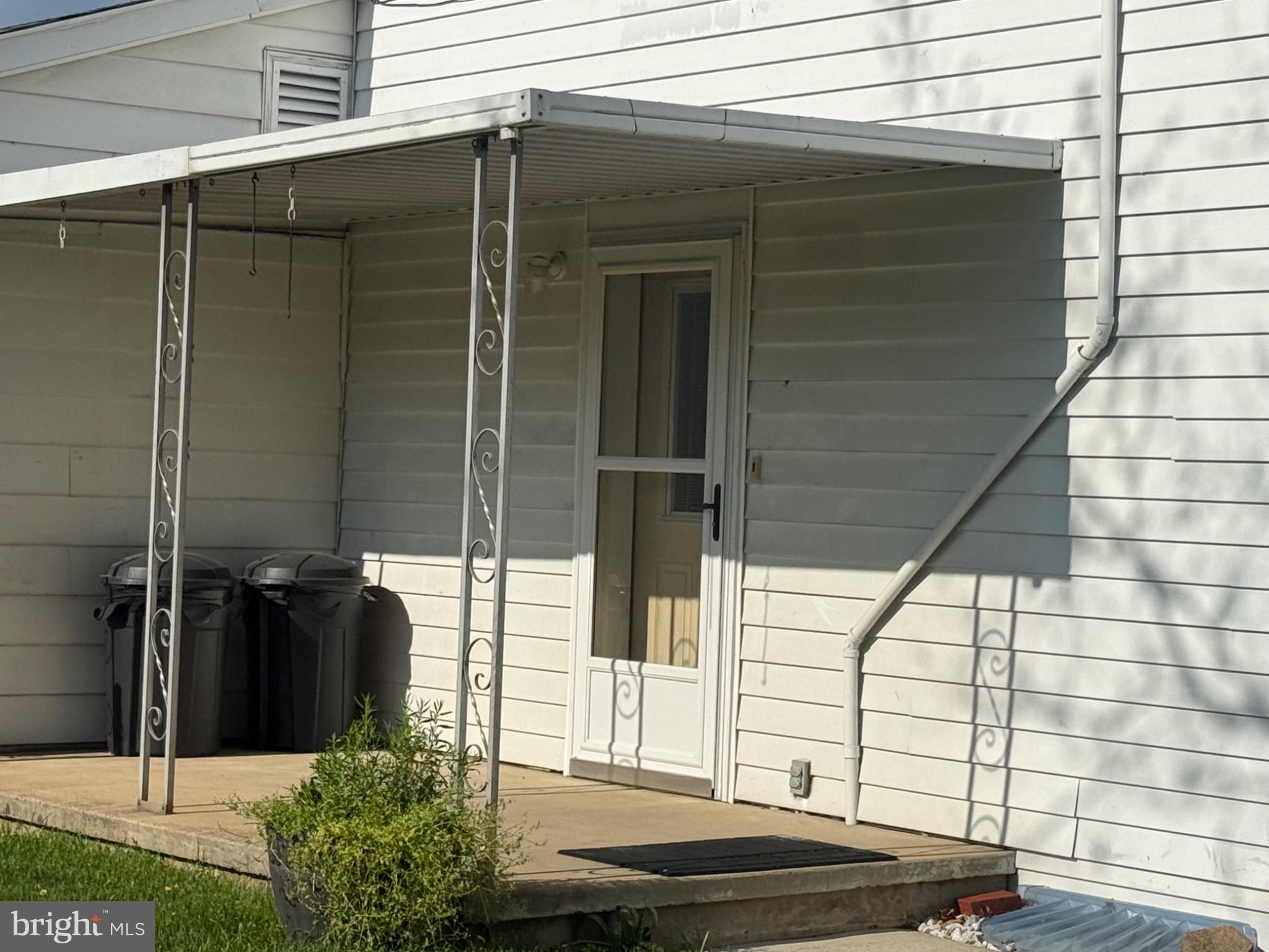 10899 Fish And Game Road, Unit 2 Waynesboro, PA 17268 - Photo 2 of 24 a front view of a house with a garage