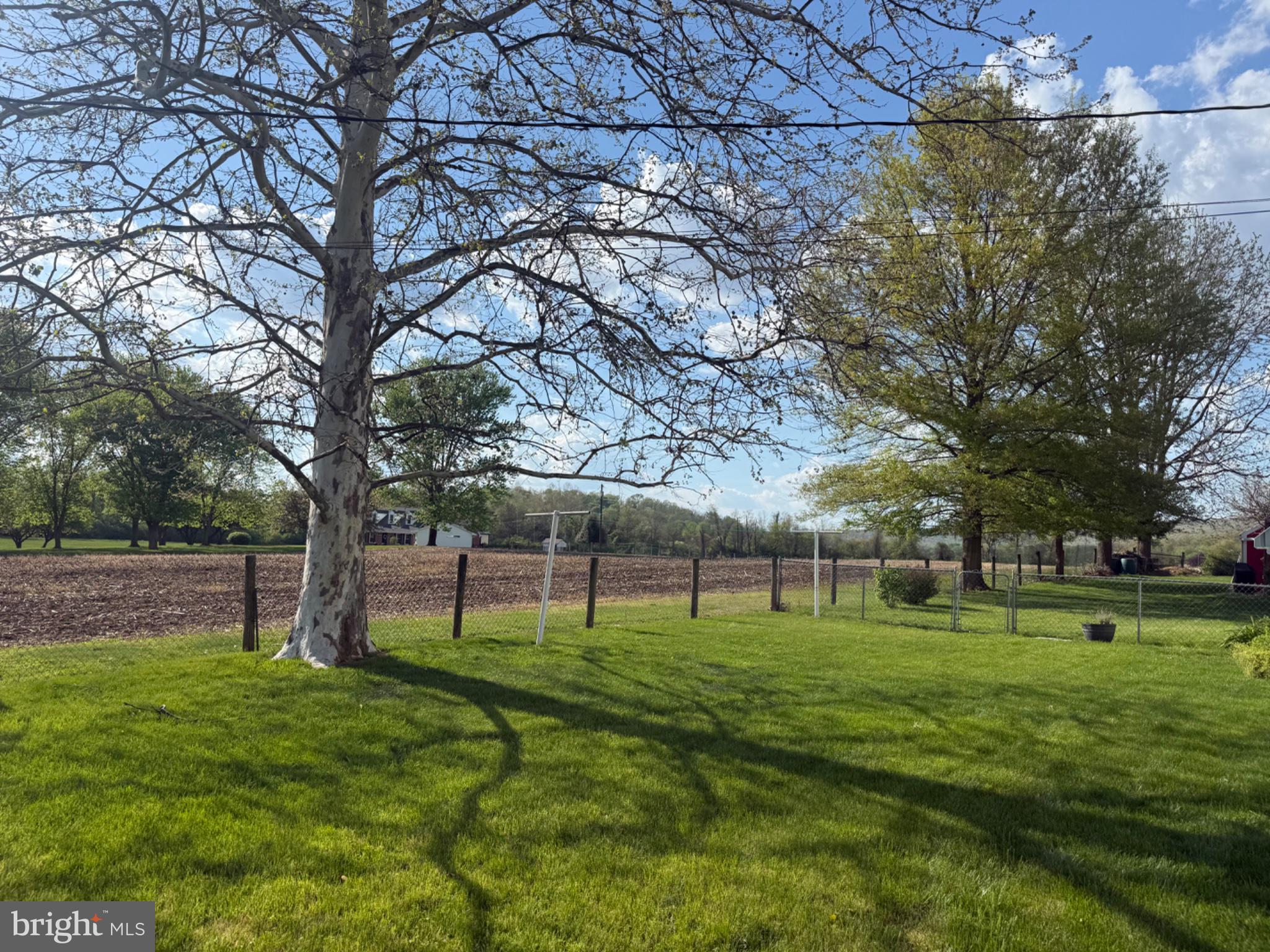 10899 Fish And Game Road, Unit 2 Waynesboro, PA 17268 - Photo 23 of 24 a view of grassy field with benches and trees