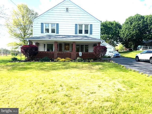 a view of a house with swimming pool
