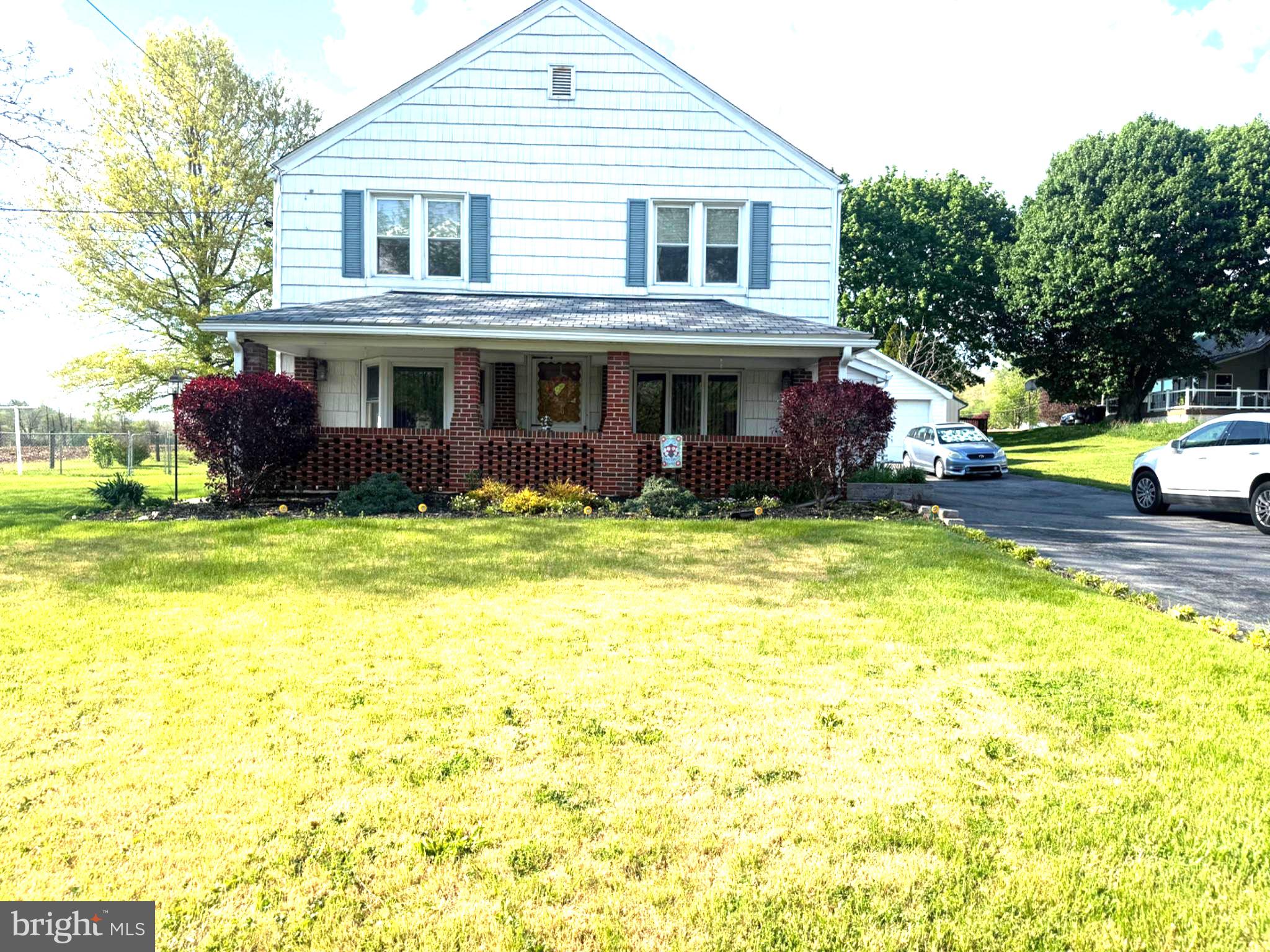 10899 Fish And Game Road, Unit 2 Waynesboro, PA 17268 - Photo 3 of 24 a view of a house with swimming pool