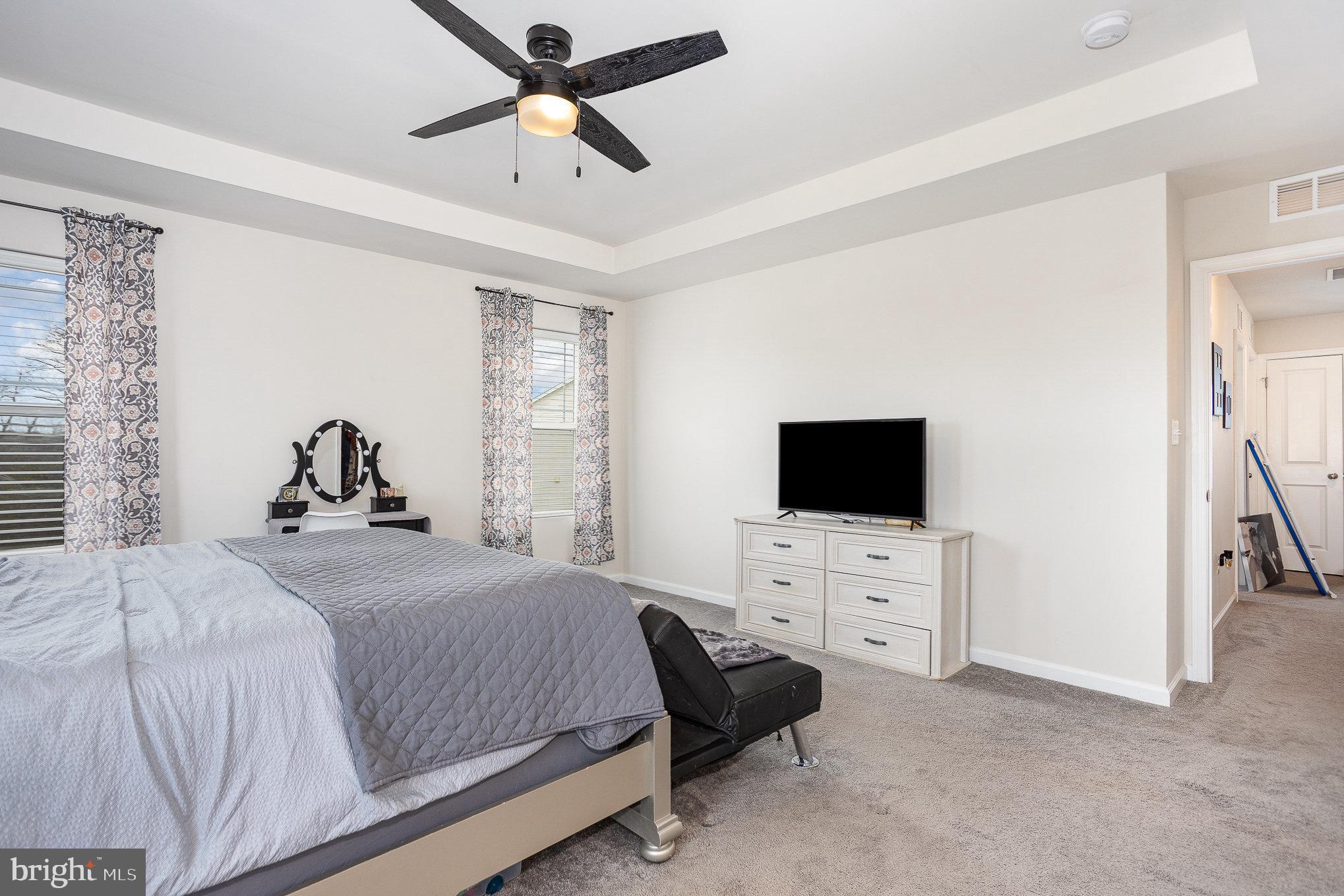 10 Beech Ridge Lane York, PA 17404 - Photo 21 of 47 a bedroom with a bed and a flat screen tv