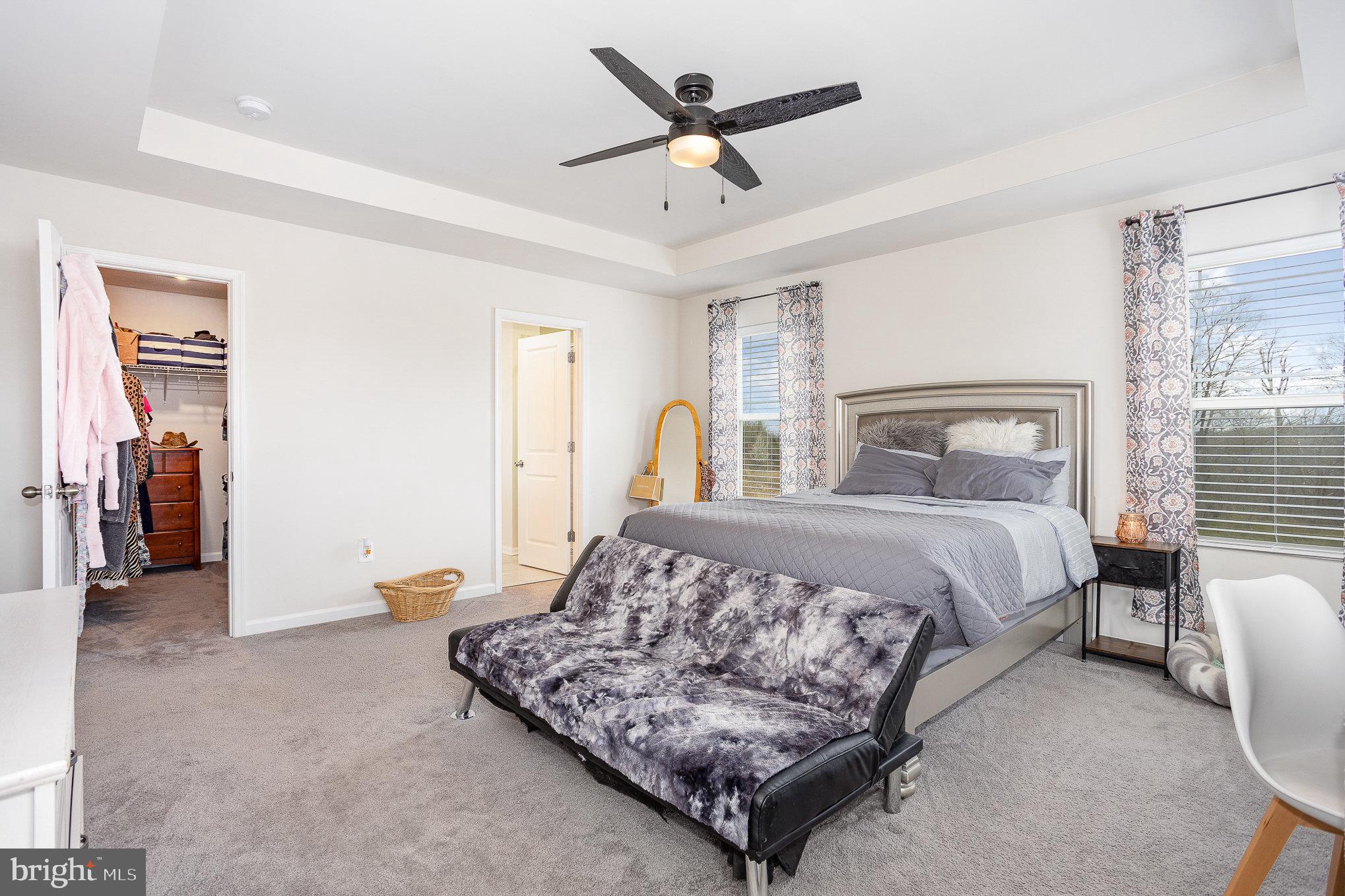 10 Beech Ridge Lane York, PA 17404 - Photo 22 of 47 a bedroom with a bed and ceiling fan