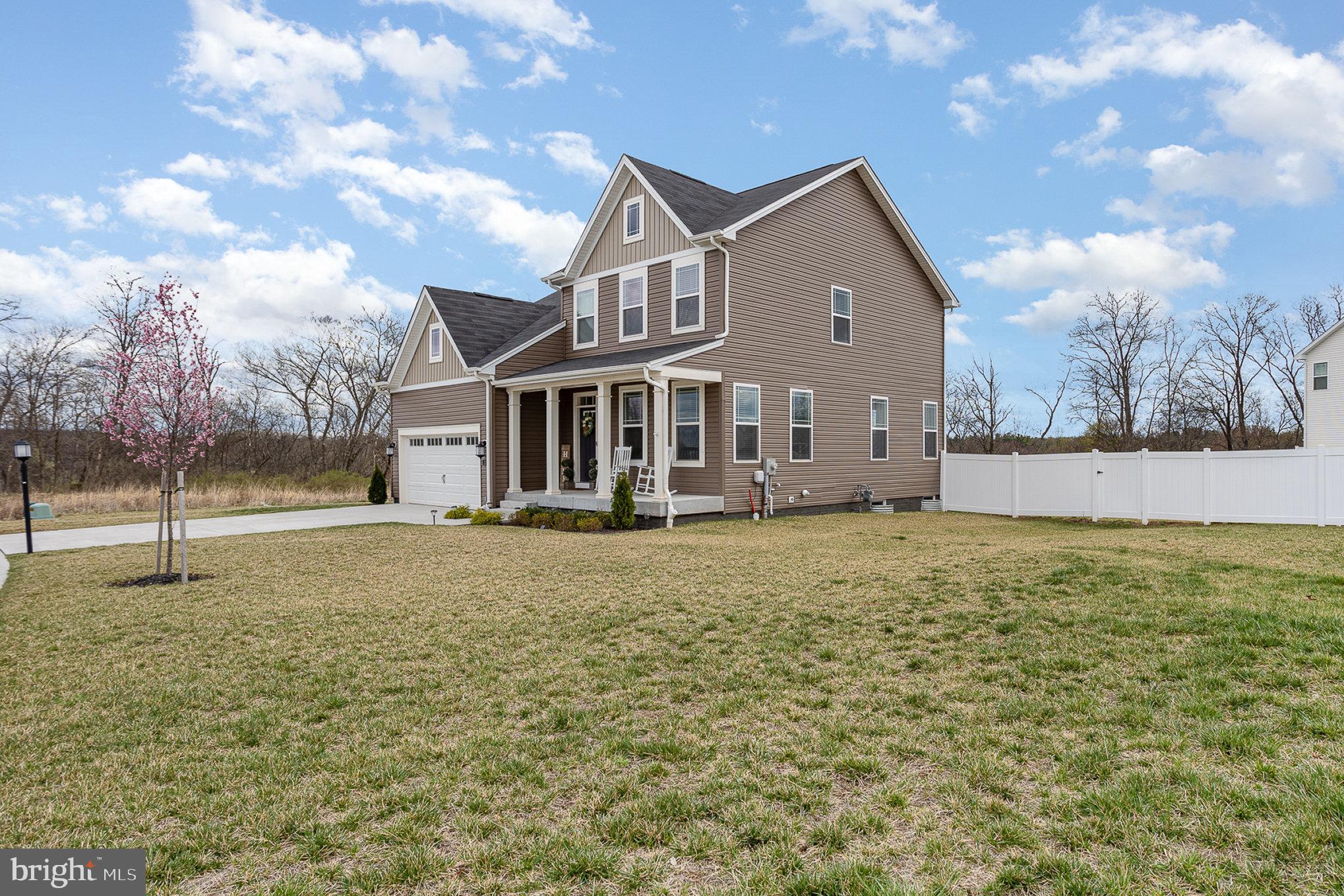 10 Beech Ridge Lane York, PA 17404 - Photo 4 of 47 a front view of a house with a yard