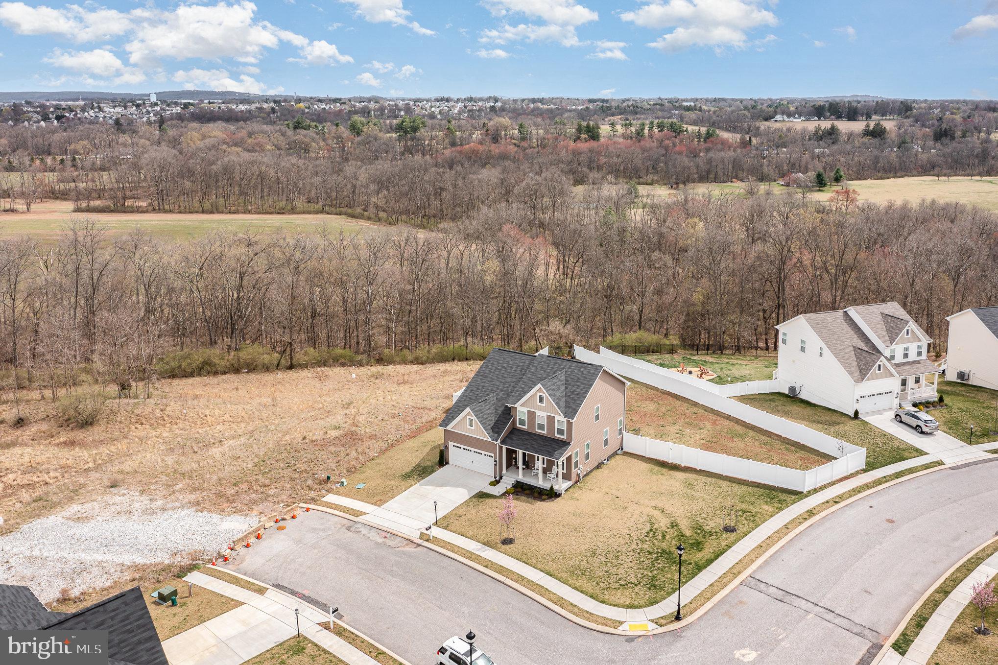 10 Beech Ridge Lane York, PA 17404 - Photo 42 of 47 a view of a lake with a terrace