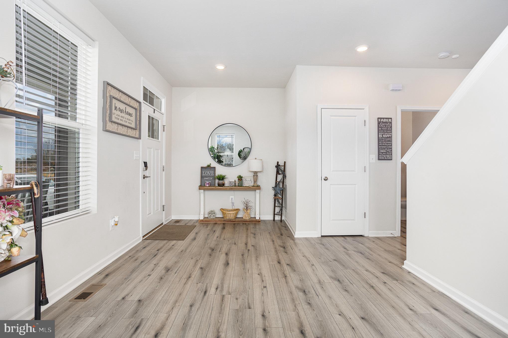 10 Beech Ridge Lane York, PA 17404 - Photo 8 of 47 wooden floor in an empty room with a window