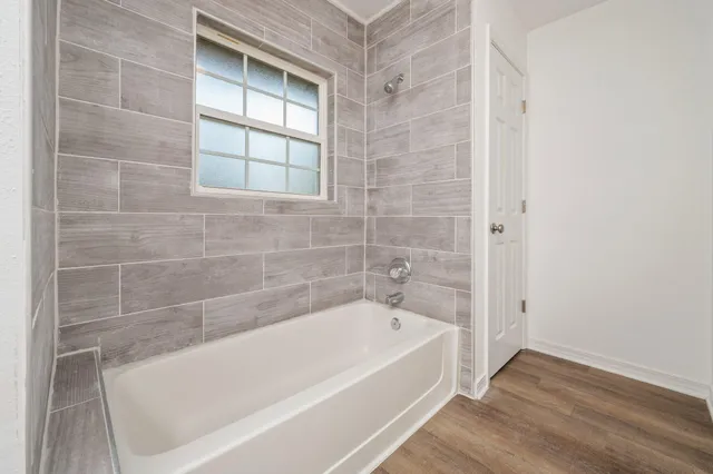 a bathroom with a bathtub