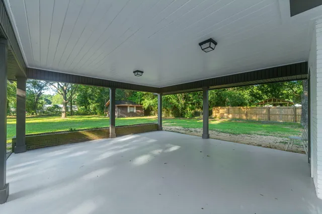a view of a house with big yard