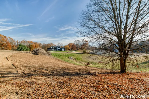 $325,000 | 2825 Terra Nova Drive Southeast, Ada, MI 49301