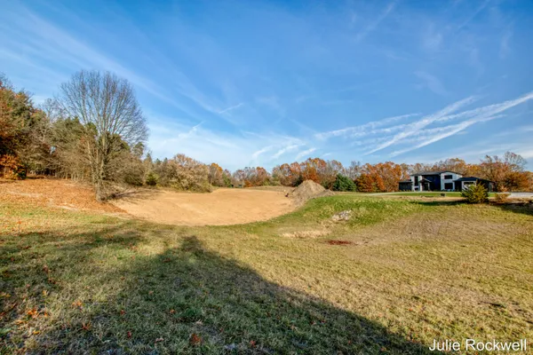 $325,000 | 2825 Terra Nova Drive Southeast, Ada, MI 49301