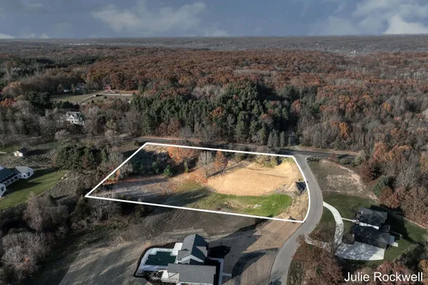 $325,000 | 2825 Terra Nova Drive Southeast, Ada, MI 49301