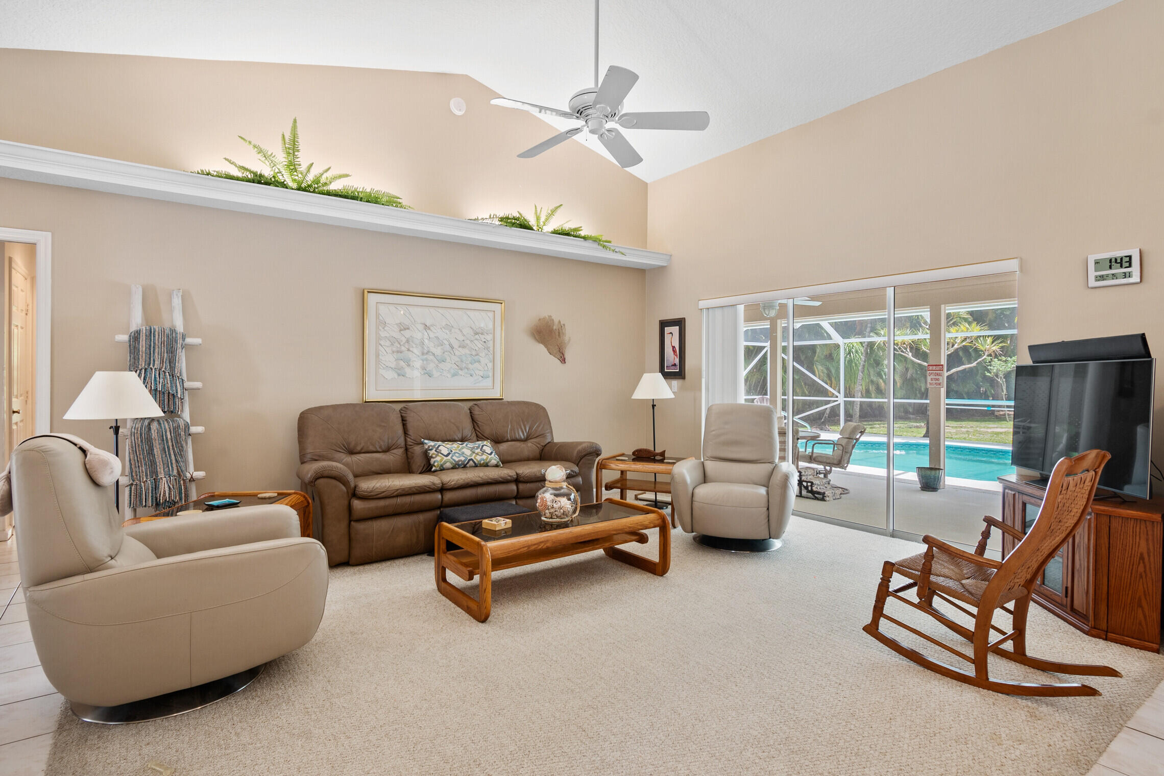 9232 154th Road North Jupiter, FL 33478 - Photo 3 of 40 Living Room & Pool area