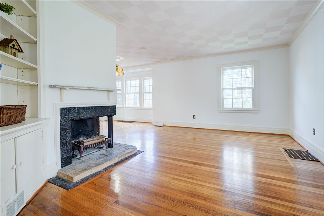 54 Nunda Boulevard Rochester, NY 14610 - Photo 6 of 40 Coxy up to the woodburning fireplace on the cold n