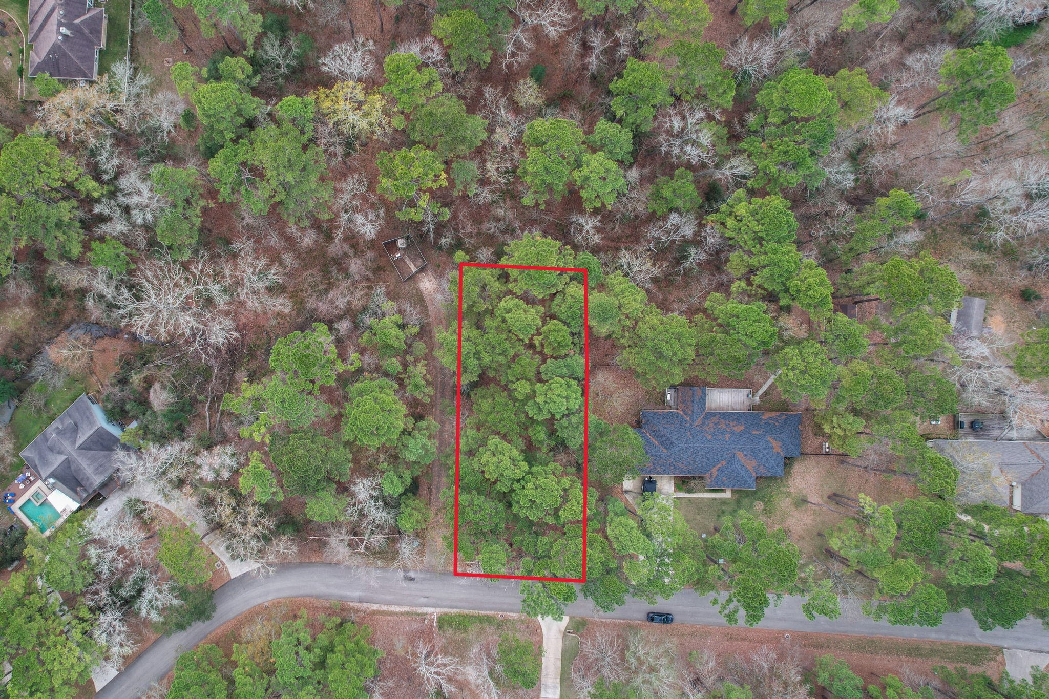 219 Kings Way Coldspring, TX 77331 - Photo 12 of 12 an aerial view of a house with a yard