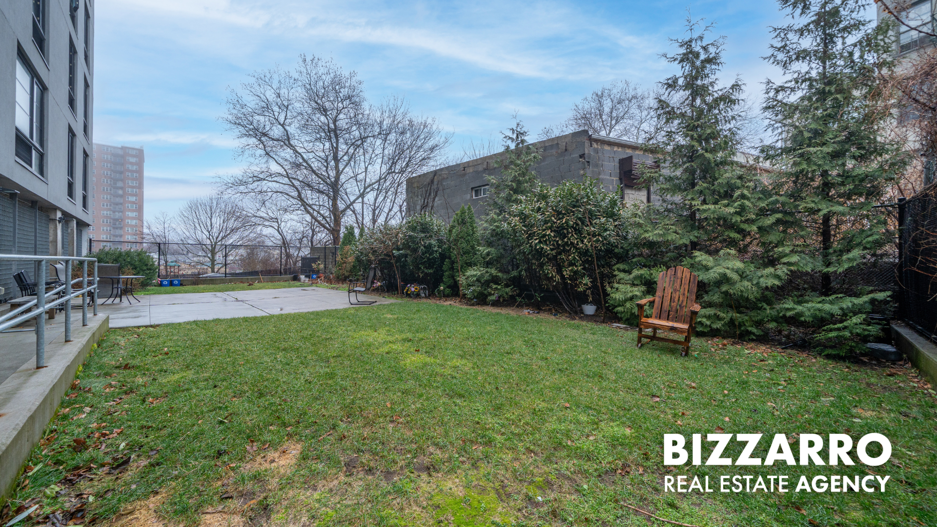 Tilden Street, Unit 6F Bronx, NY 10467 - Photo 23 of 29 a view of a sign in front of a big yard with plants and large trees