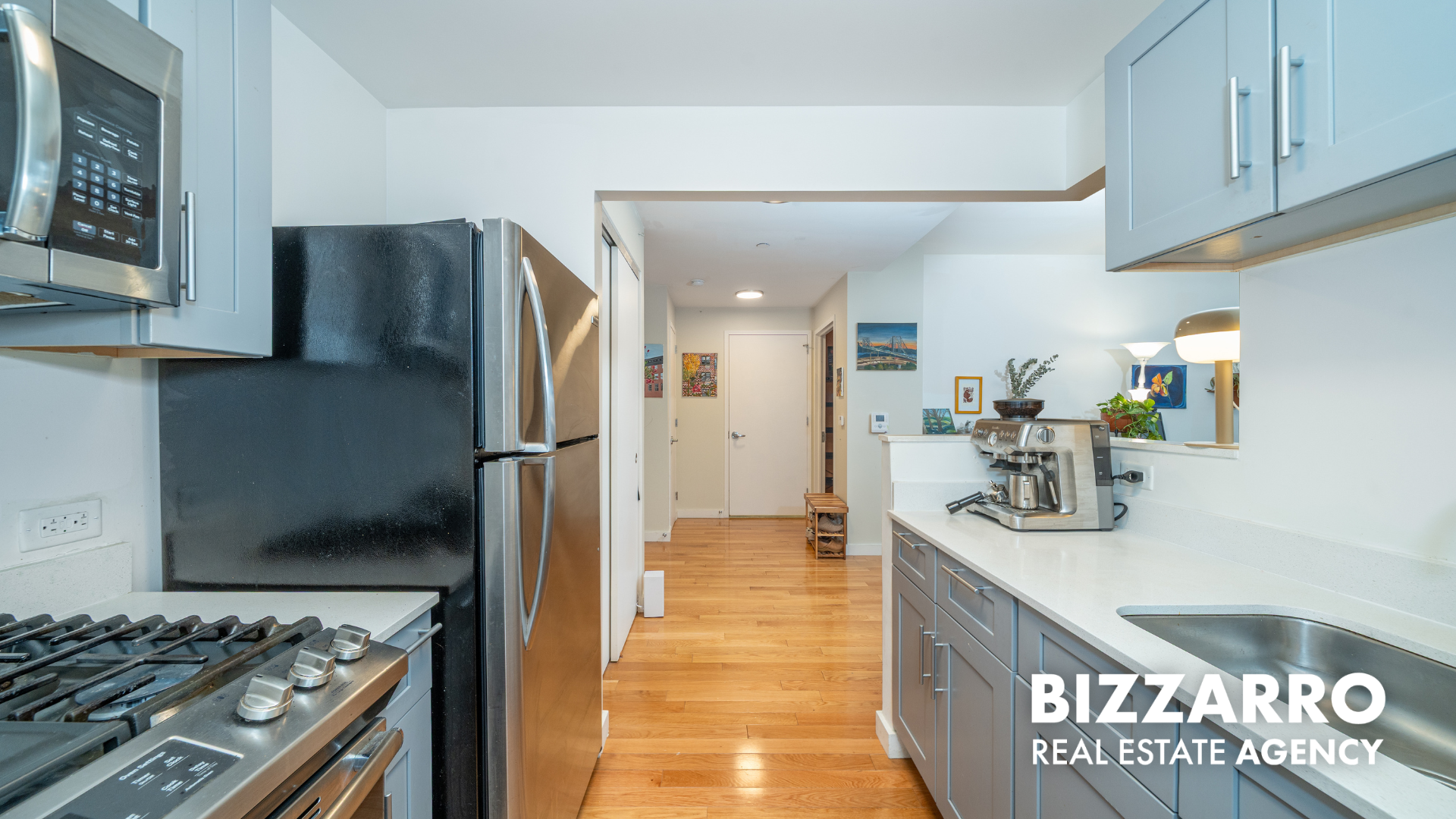 Tilden Street, Unit 6F Bronx, NY 10467 - Photo 6 of 29 a kitchen with stainless steel appliances granite countertop a refrigerator and a stove