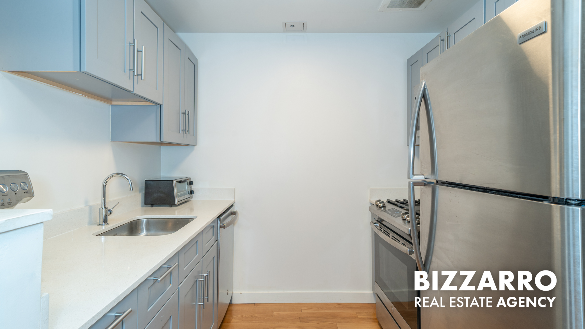 Tilden Street, Unit 6F Bronx, NY 10467 - Photo 7 of 29 a kitchen with a refrigerator and a sink