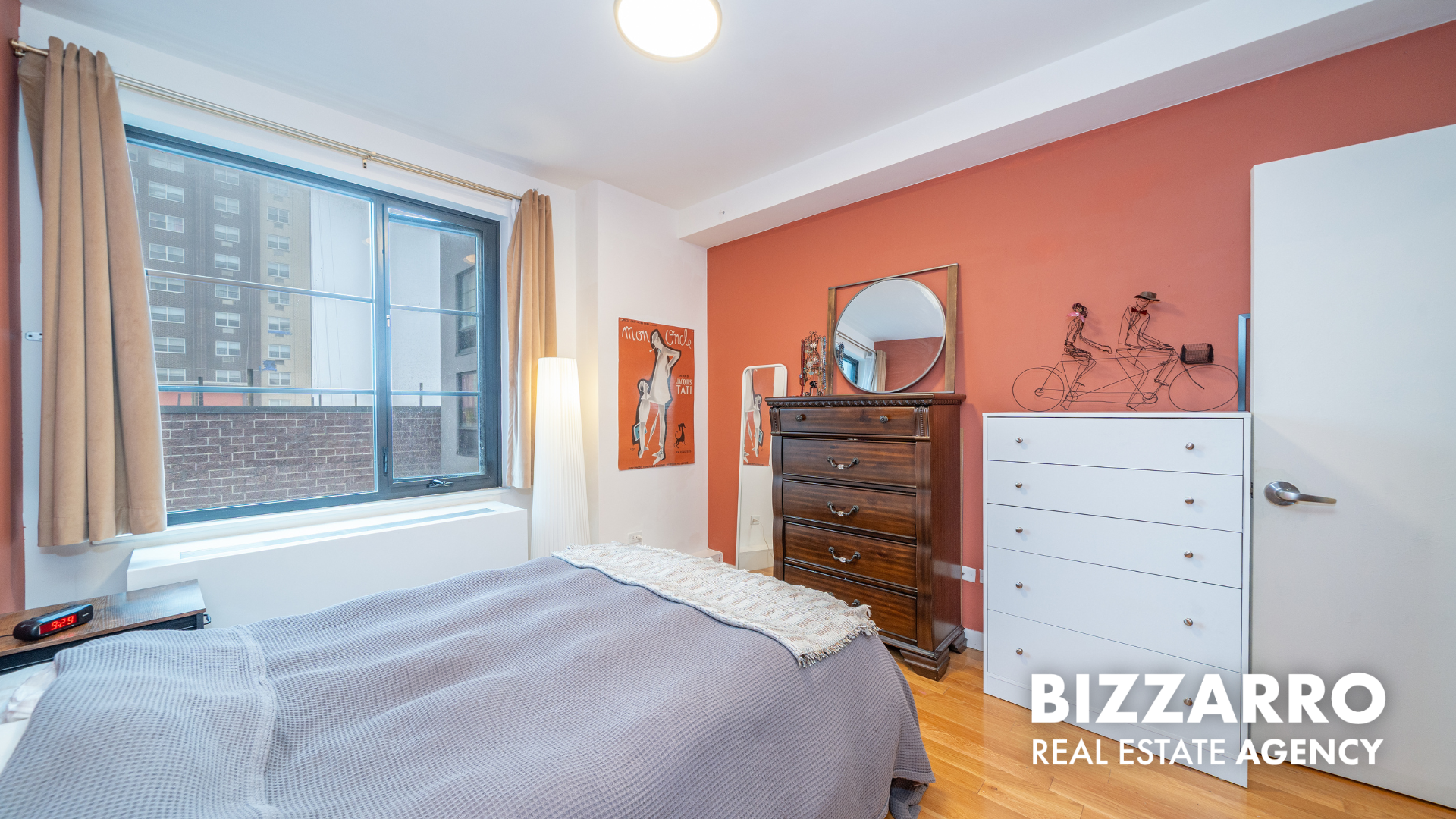 Tilden Street, Unit 6F Bronx, NY 10467 - Photo 8 of 29 a bedroom with a bed and a dresser