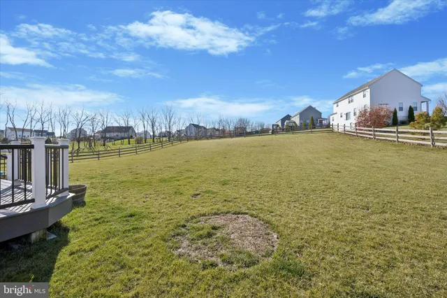 a view of a lake with a big yard