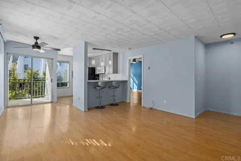 a view of a kitchen with furniture and a kitchen