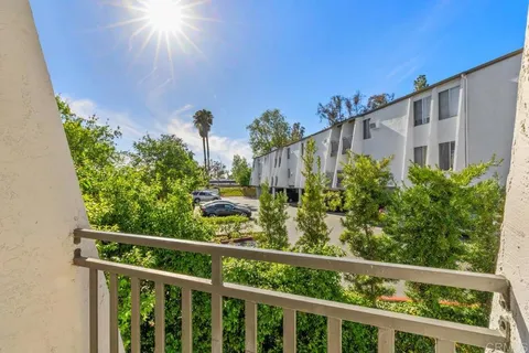 a view of a balcony with an outdoor space