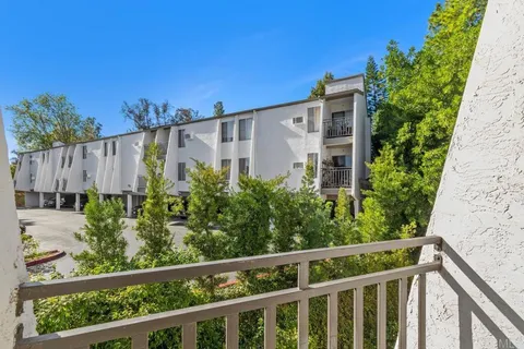 a view of a building from a balcony