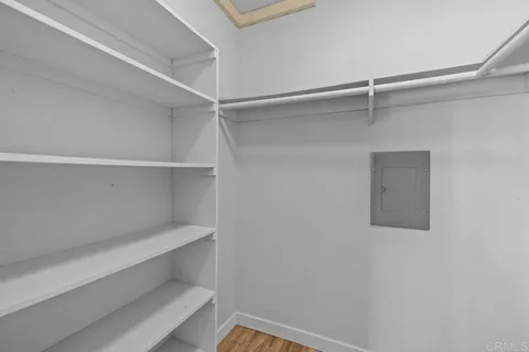 a view of an empty walk in closet