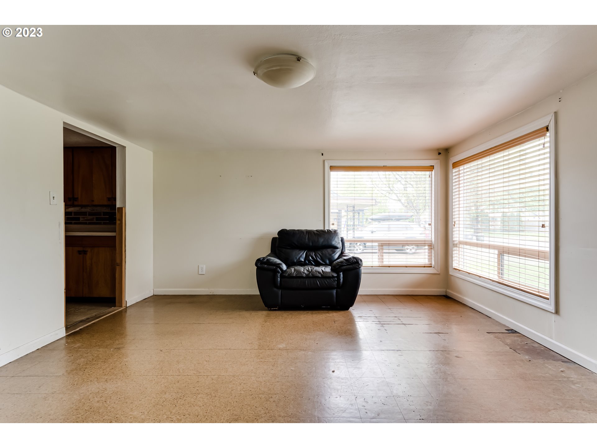 1163 D Street Springfield, OR 97477 - Photo 17 of 37 a living room with furniture and a large window