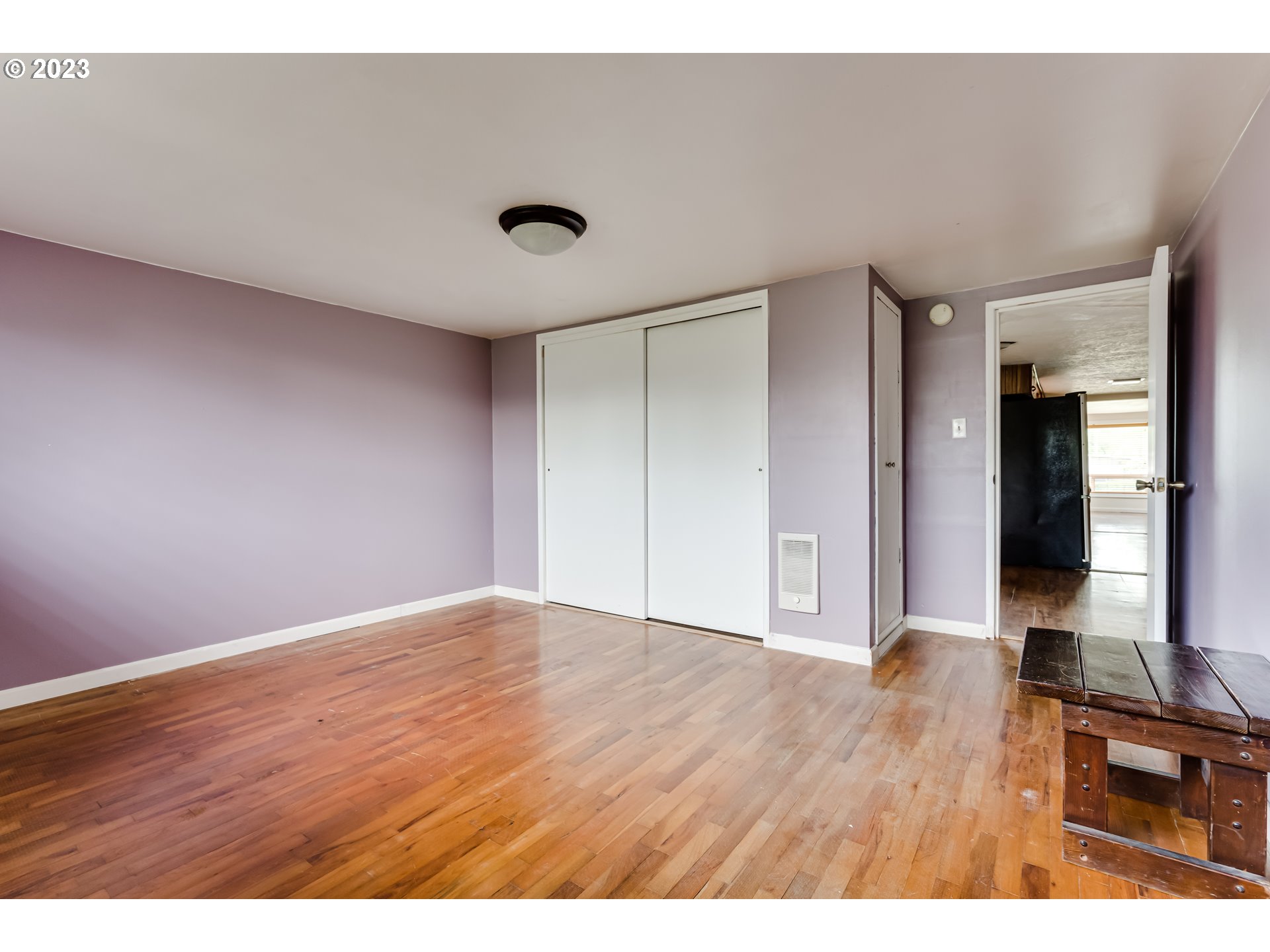 1163 D Street Springfield, OR 97477 - Photo 19 of 37 a view of an empty room with wooden floor