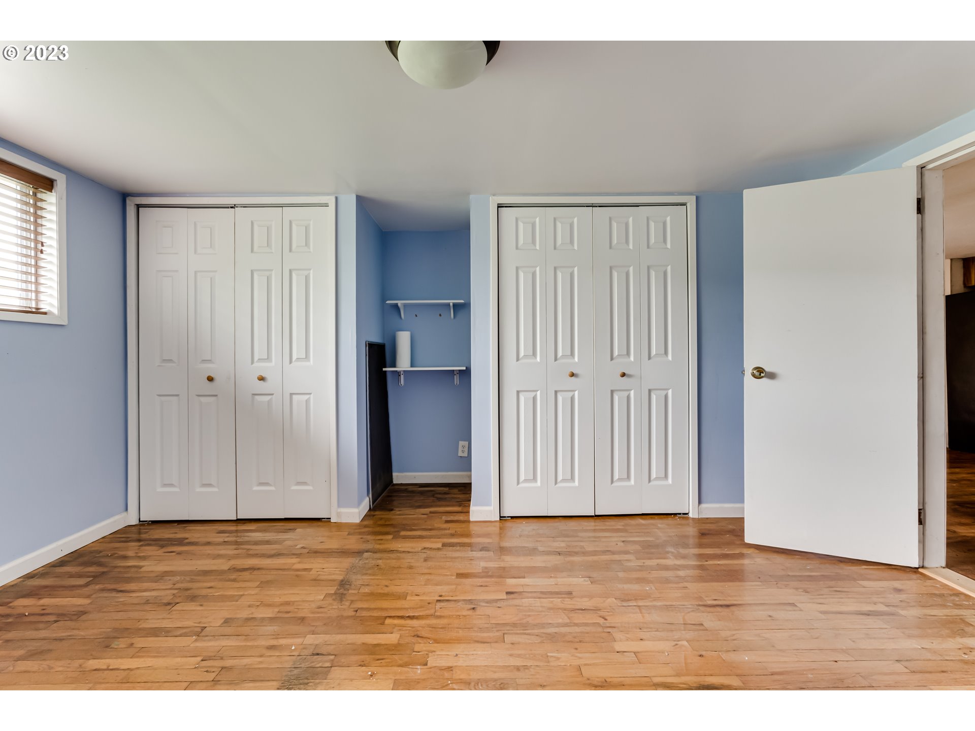 1163 D Street Springfield, OR 97477 - Photo 21 of 37 a view of an empty room with wooden floor