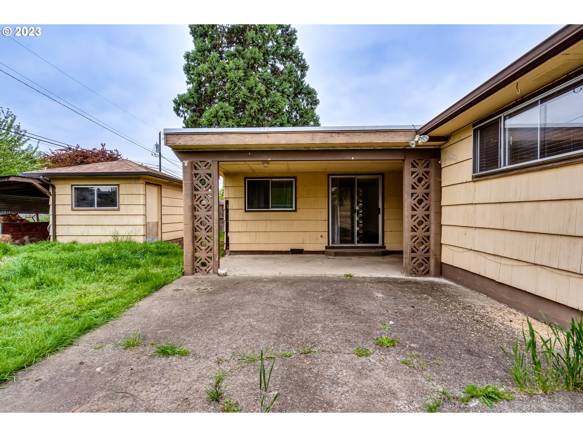1163 D Street Springfield, OR 97477 - Photo 30 of 37 a view of a house with a yard