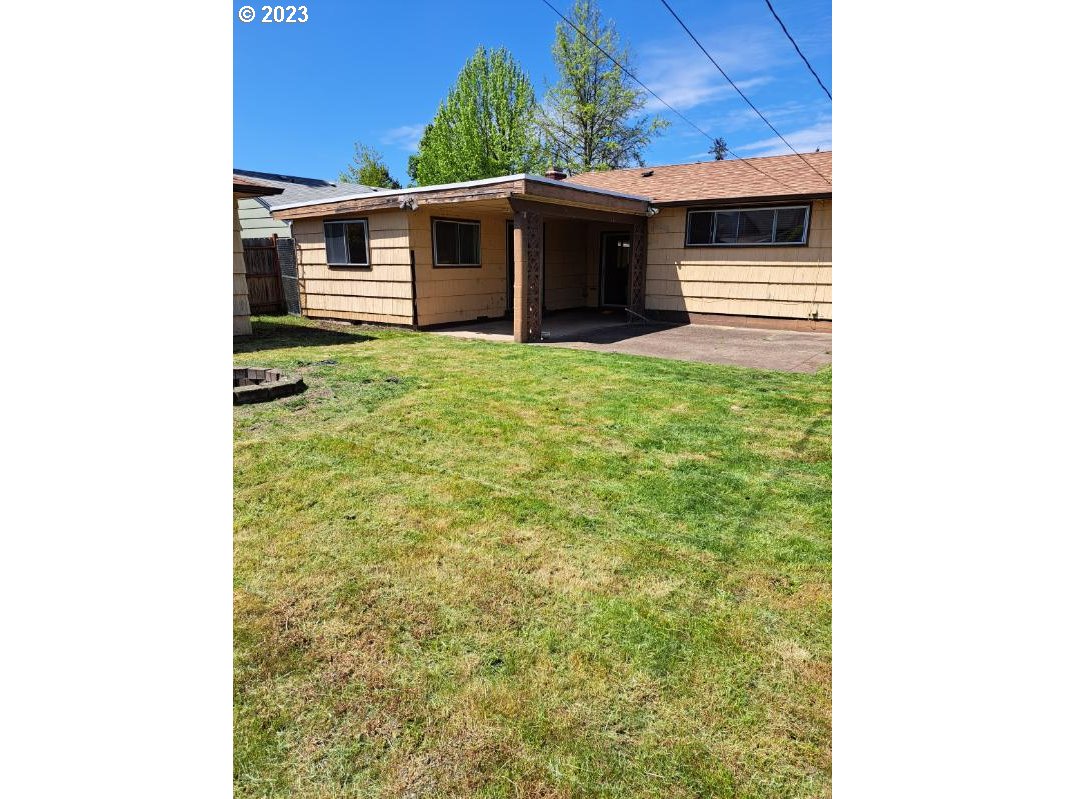 1163 D Street Springfield, OR 97477 - Photo 37 of 37 a view of house with backyard