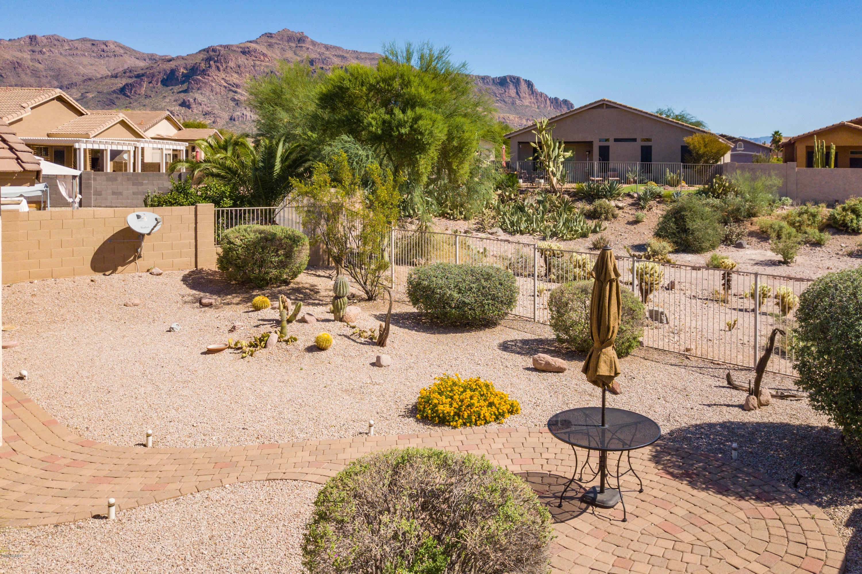 4291 South Strong Box Road Gold Canyon, AZ 85118 - Photo 23 of 27 a view of a house with a yard