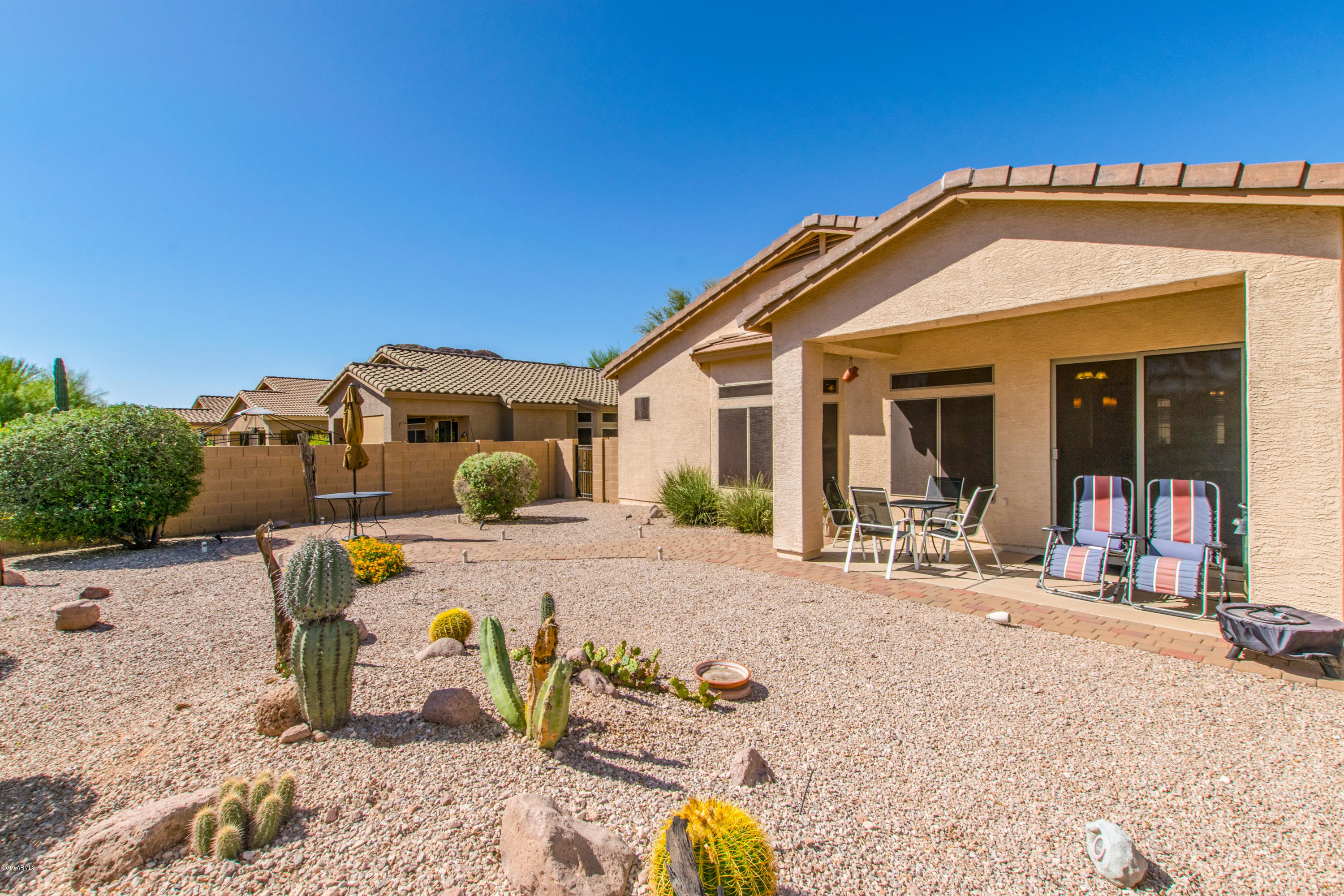 4291 South Strong Box Road Gold Canyon, AZ 85118 - Photo 27 of 27 a view of a house with patio