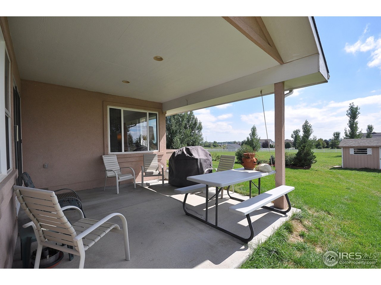6402 Ashcroft Road Greeley, CO 80634 - Photo 23 of 25 Kitchen Patio