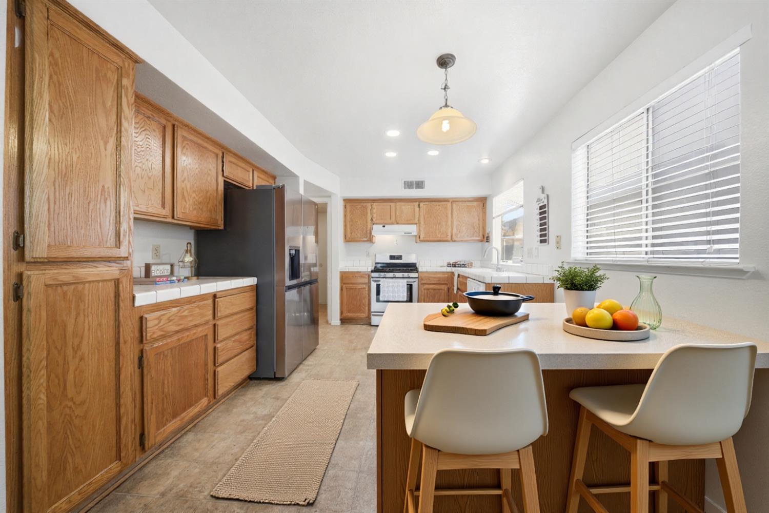 8317 Bramble Bush Circle Antelope, CA 95843 - Photo 13 of 34 Virtually staged kitchen breakfast area