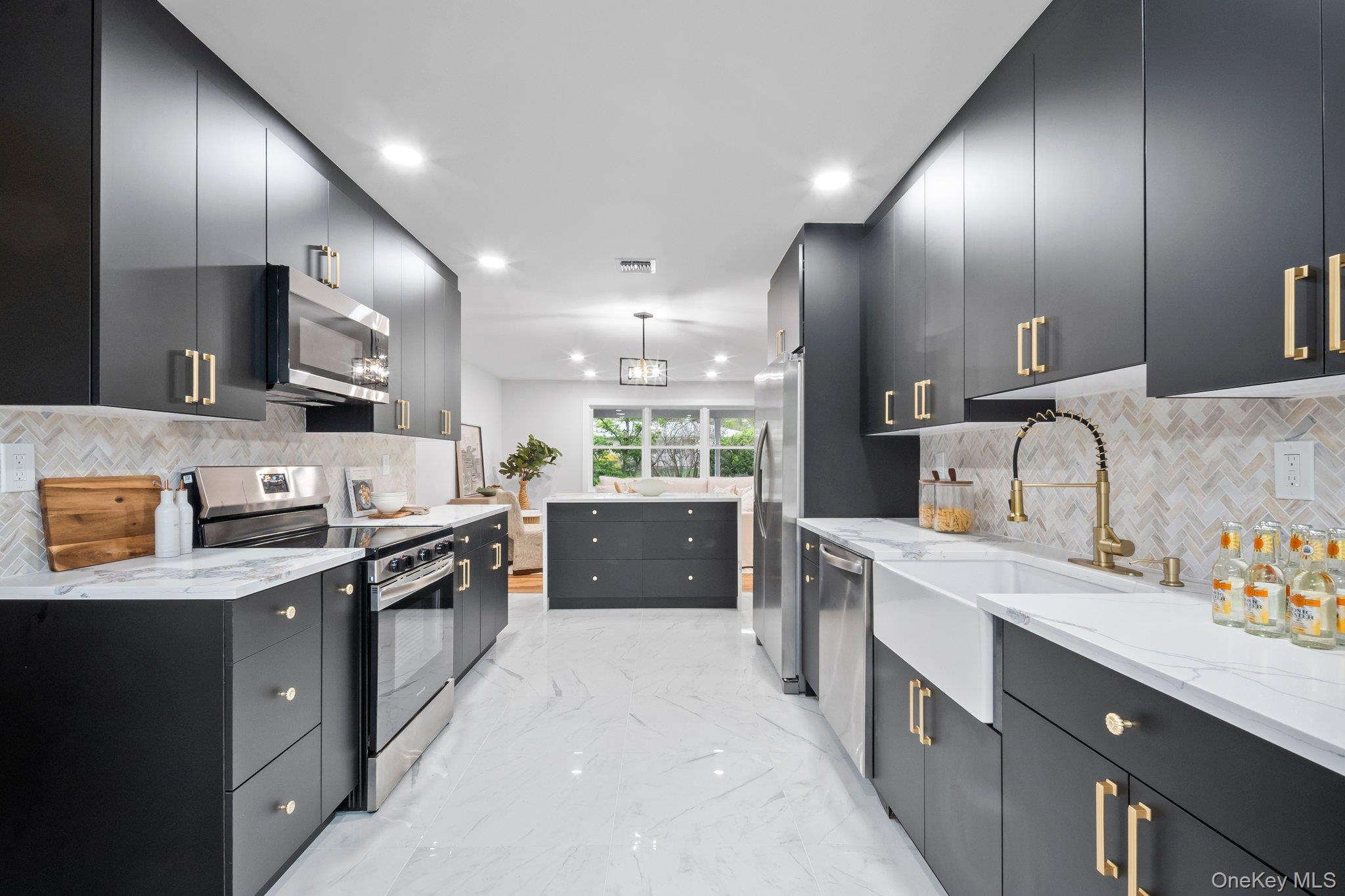 46 Mt Grey Road Stony Brook, NY 11790 - Photo 12 of 15 a large kitchen with stainless steel appliances lots of counter top space