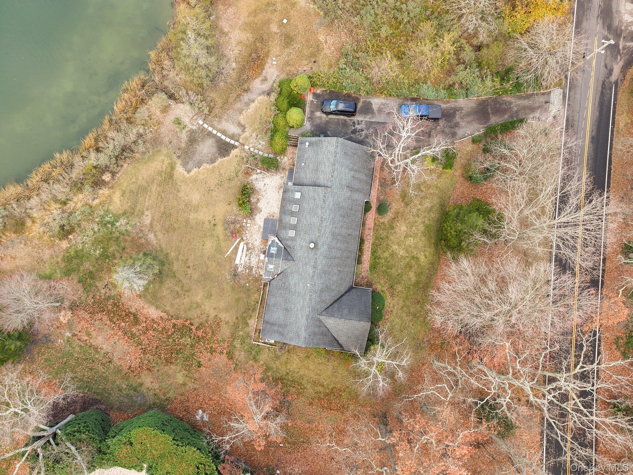 46 Mt Grey Road Stony Brook, NY 11790 - Photo 5 of 15 a aerial view of a house with a yard